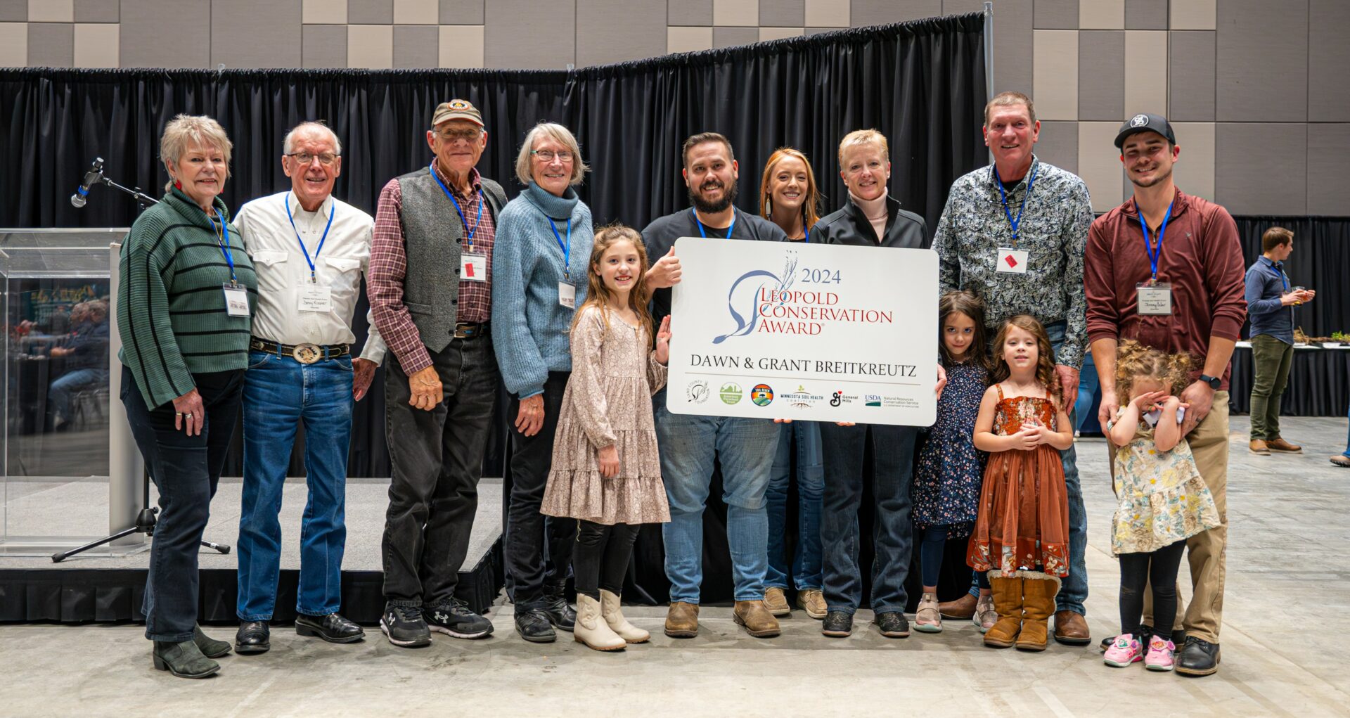 08 2024 Minnesota Leopold Conservation Award winners Dawn & Grant Breitkreutz with family.